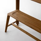 Glide Dining Bench made from recycled teak, showcasing its sleek design and natural wood texture.