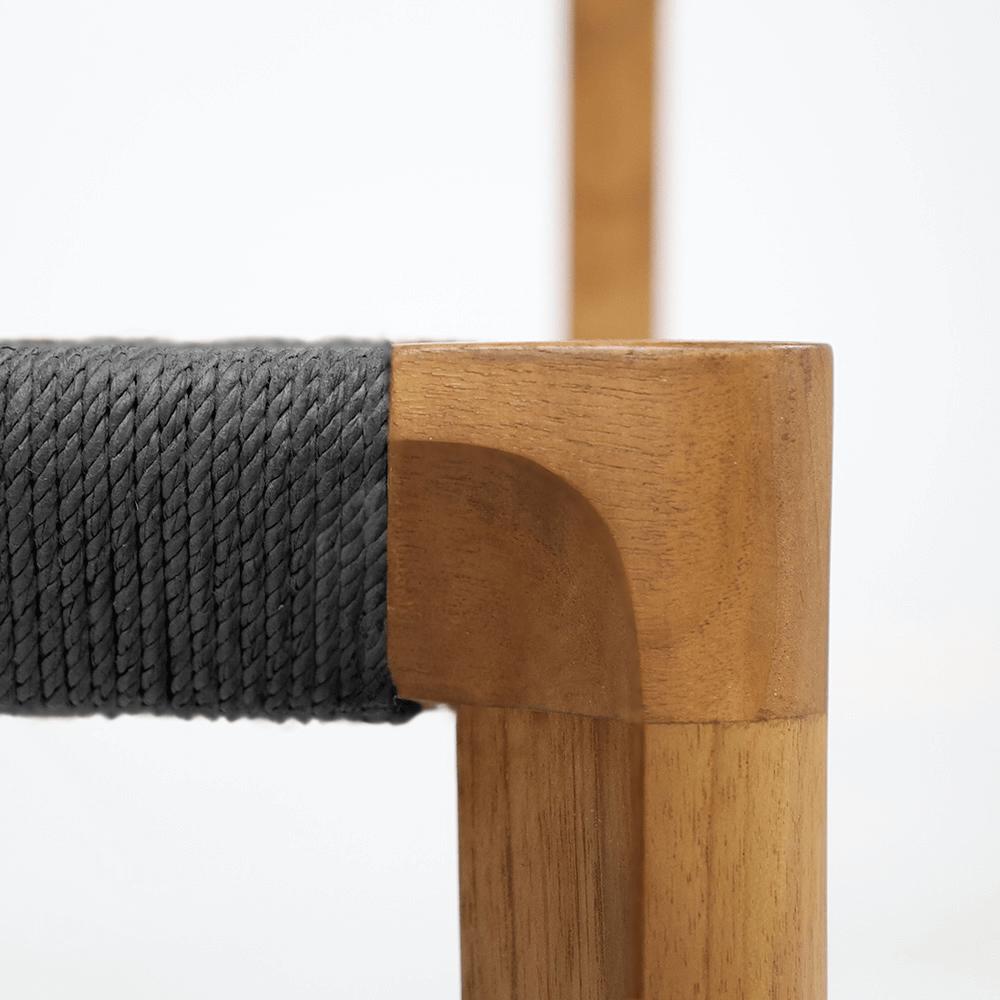 Teak dining chair with black loom seat view