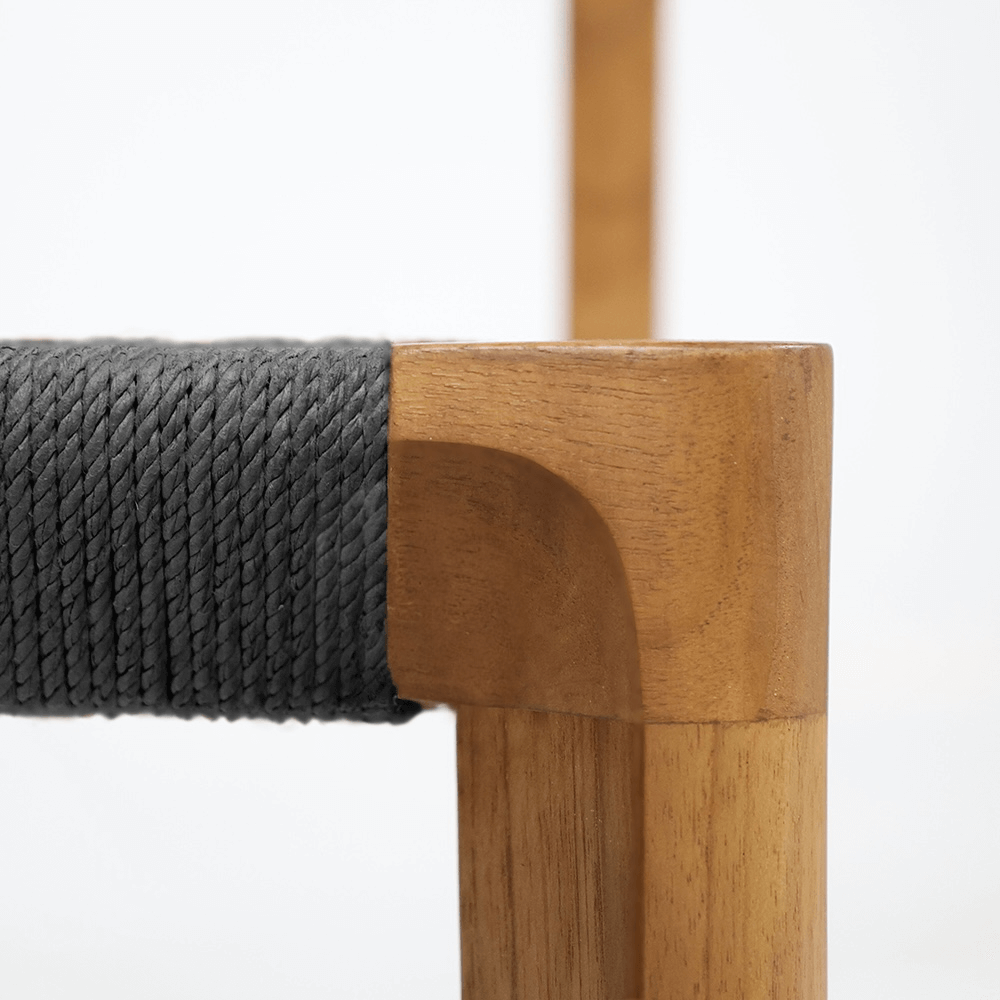 Teak dining chair with black loom seat view
