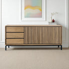Buffet sideboard with side drawers, made of recycled teak wood, featuring a modern design and sleek black accents.