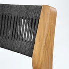 Teak dining chair with black loom back view 