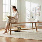 Sustainable Glide Dining Bench crafted from recycled teak, showcasing distinct grain and modern design.