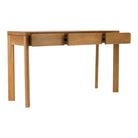 A solid teak console table with three drawers on a plain white background.